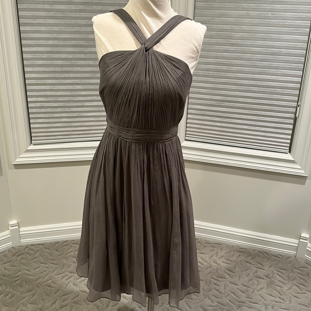 Stunning grey silk dress. Just worn once and the perfect choice for any event.